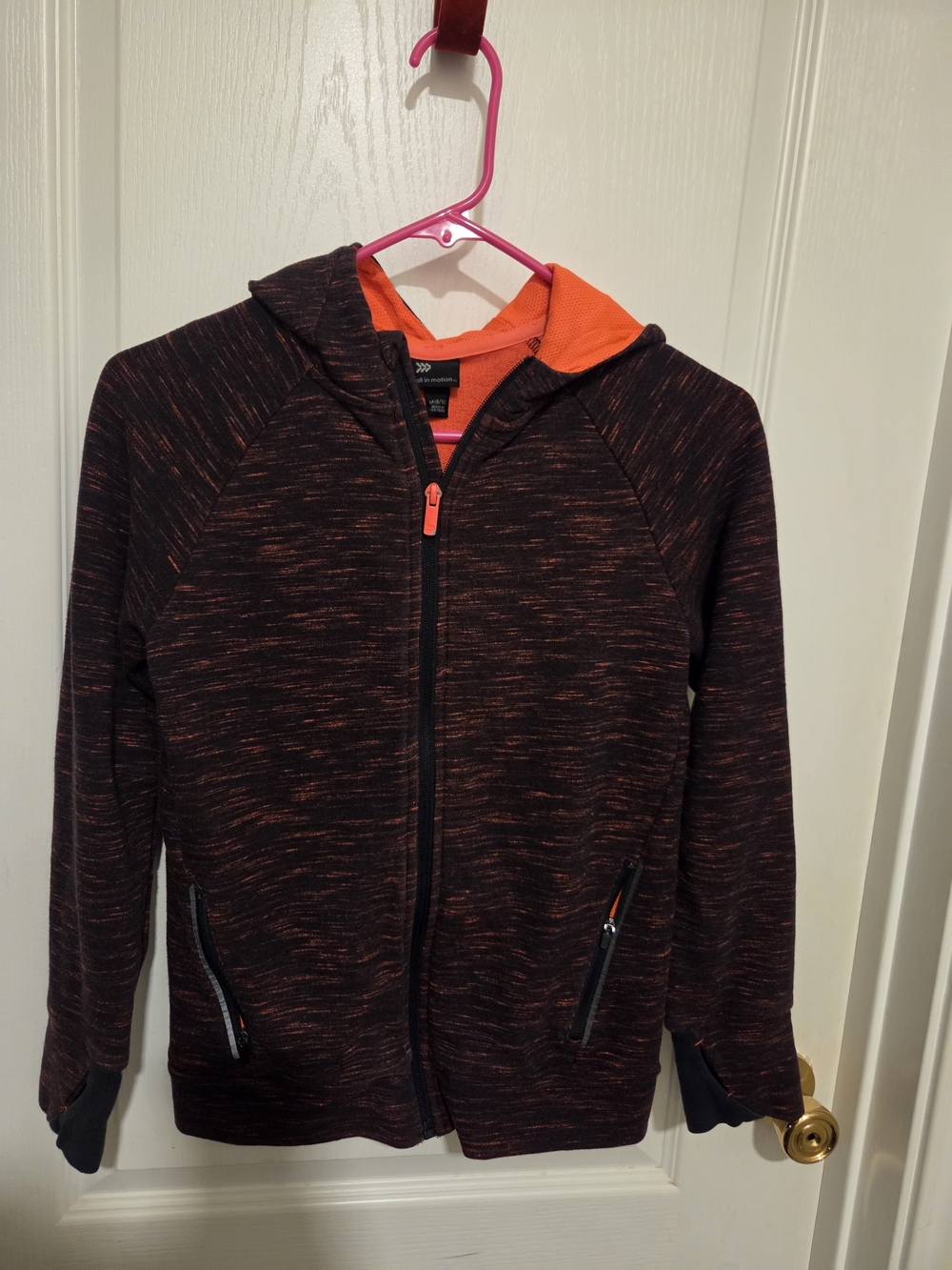 all in motion Black Jacket with Orange Lining and Accents